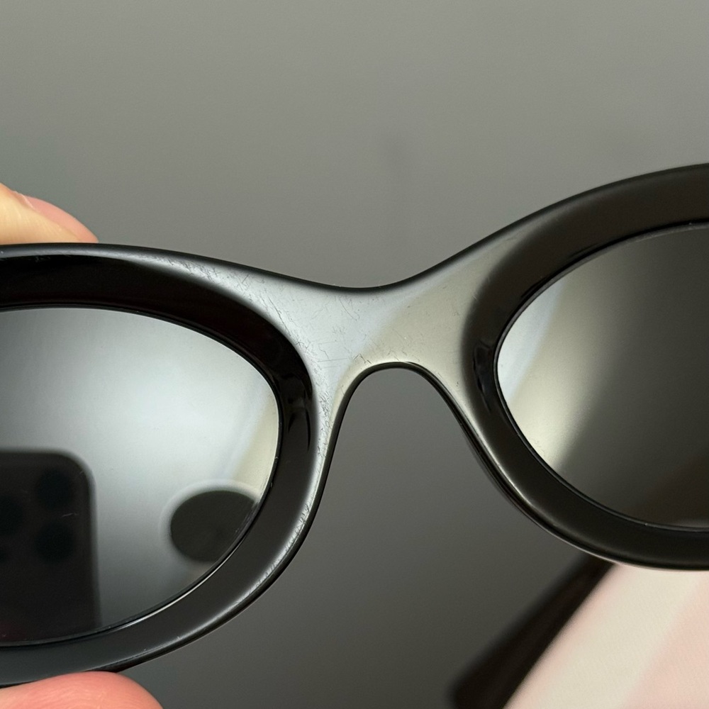 Miu Miu Black Oval Sunglasses with Gold Logo Temples - Picture 7 of 14